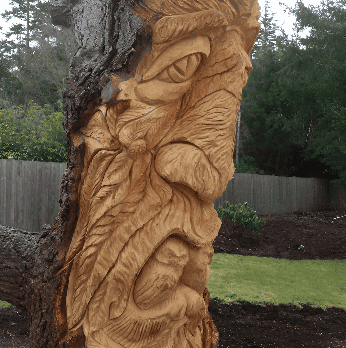 native american totem carved from a tree stump