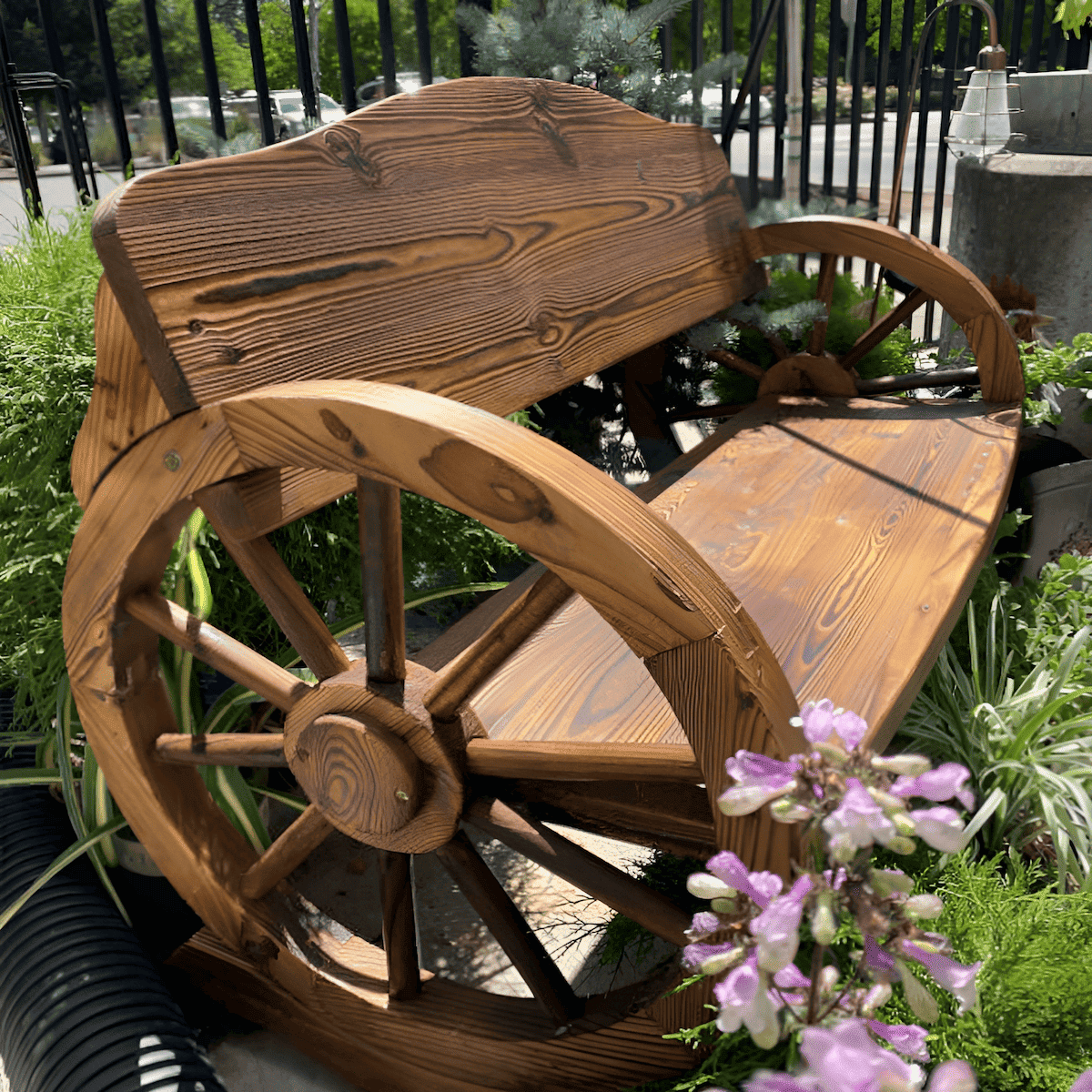 using a wood wagon wheel in the garden