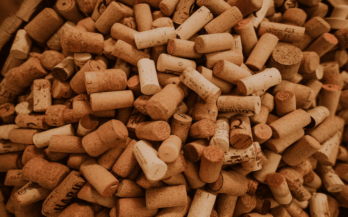 individual stoppers cut and stacked from a sheet of cork bark