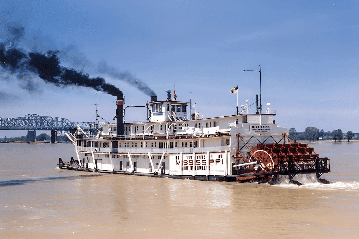 wood water wheels used to steer and power a riverboat