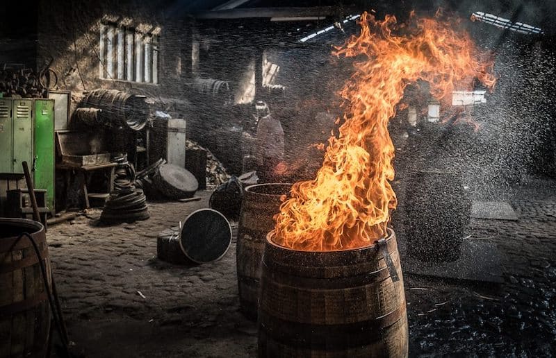 seasoning a wood barrel with fire